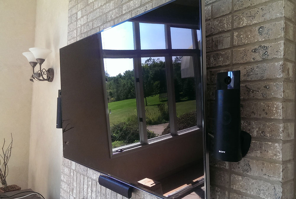 Brick Fireplace TV Mounting with Surround Sound