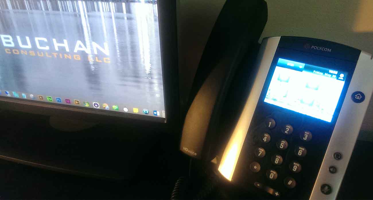 Polycom VVX 500 on Desk of Buchan Consulting LLC CEO